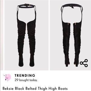 Thigh high belted boots